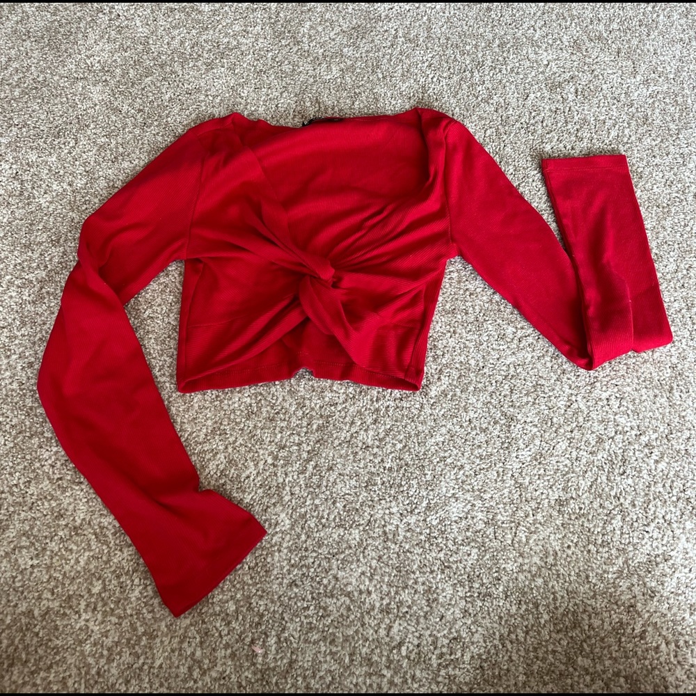 Red cropped long sleeve nigh out top